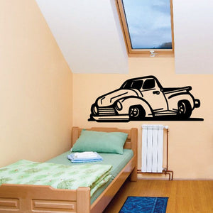 Vinyl wall decal of cartoon truck in black and white, with ground line