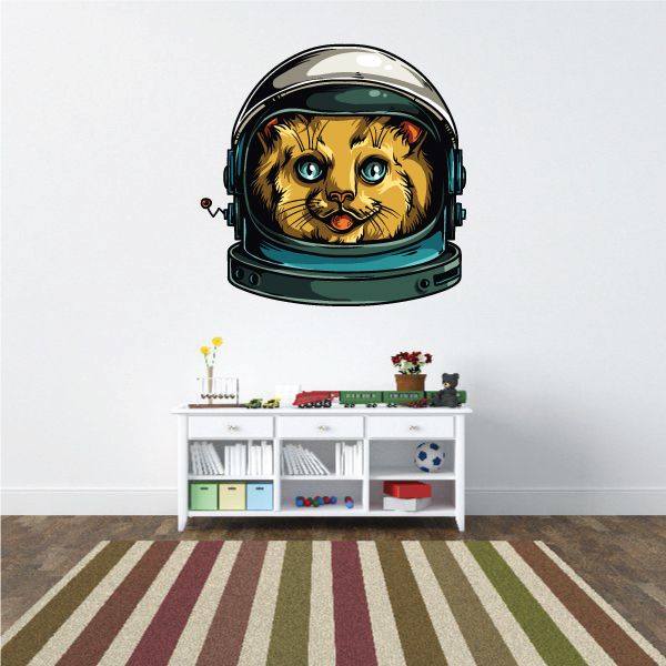 Astronaut cat sticker with orange tabby face in black space helmet, large blue eyes