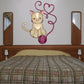 Cat with yarn heart decal: cream cat with pink yarn heart and loops