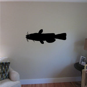Black catfish silhouette wall decal, facing left with whiskers and fins