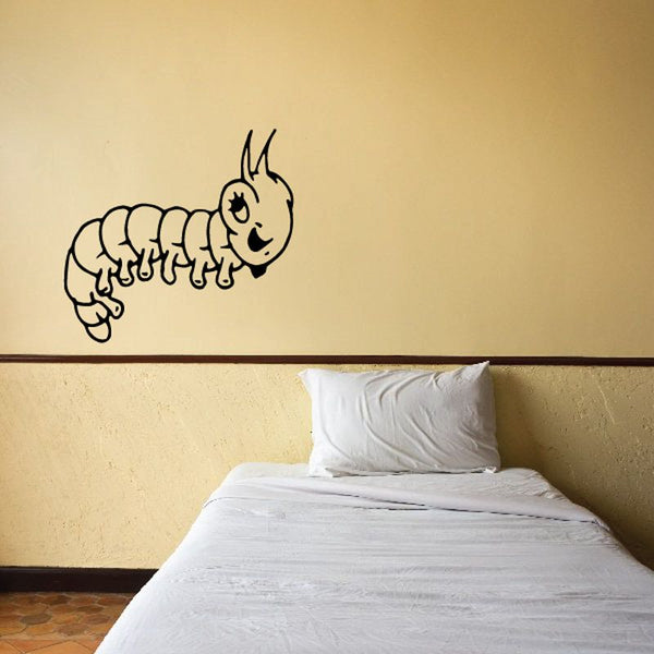 Cathy the Caterpillar wall decal, black outline with smiling segmented caterpillar