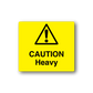 Caution heavy sticker: yellow square with warning triangle and CAUTION Heavy text