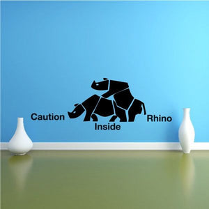 Wall decal: black rhino with caution text reading “Inside Rhino”