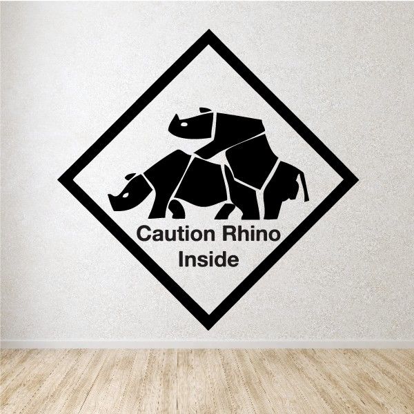 Diamond caution decal: black rhino silhouettes with 'Caution Rhino Inside' text