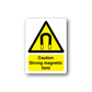 Caution strong magnetic field sticker with yellow warning triangle and bold text