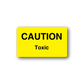 Yellow warning sticker with bold CAUTION and TOXIC text