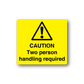 Yellow caution sticker with warning triangle; CAUTION: Two person handling required