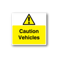 Caution vehicles sticker with yellow warning triangle and 'Caution Vehicles' text