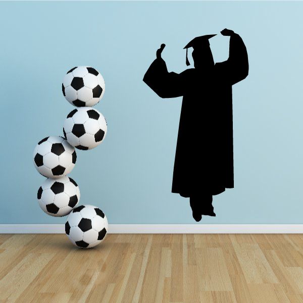 Female graduate decal of woman in cap and gown with soccer ball cluster