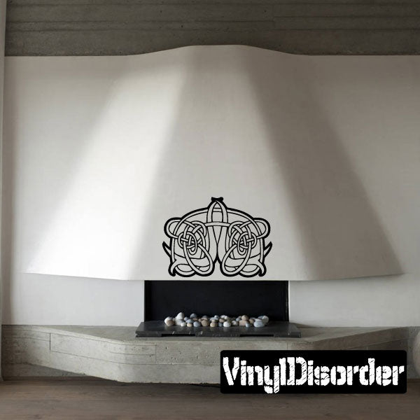 Celtic flower decal with interwoven knotwork crest in dark gray/black outline.