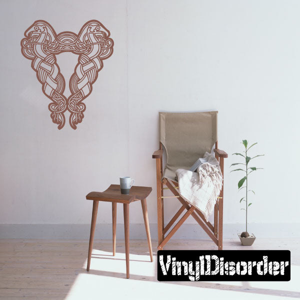 Brown celtic triangle wall decal with interlaced knot design at top center