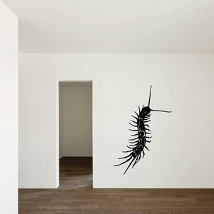 Black centipede wall decal with long antennae and segmented legs.