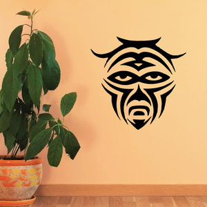 Ceremonial face paint decal with black tribal animal face design