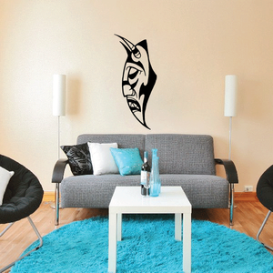 Ceremonial horned mask decal, black stylized face with curved horns