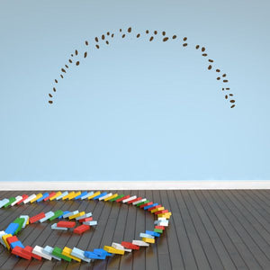 Multicolor vinyl wall decal forming a curved character face outline