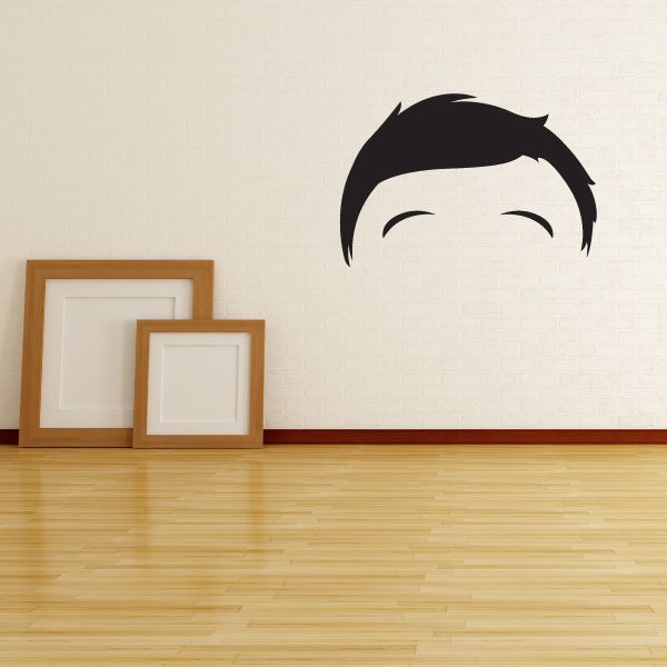 Black characterface vinyl wall decal with arched eyebrows and short hair