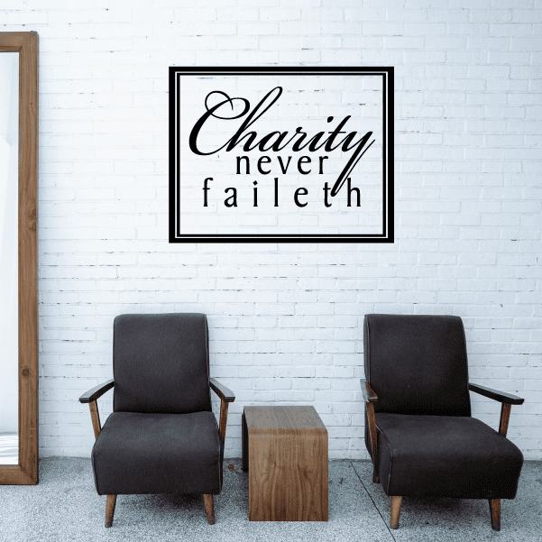 Framed "Charity never faileth" wall decal with black lettering