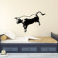 Chasing bull wall decal in black silhouette, running figure with tail raised.