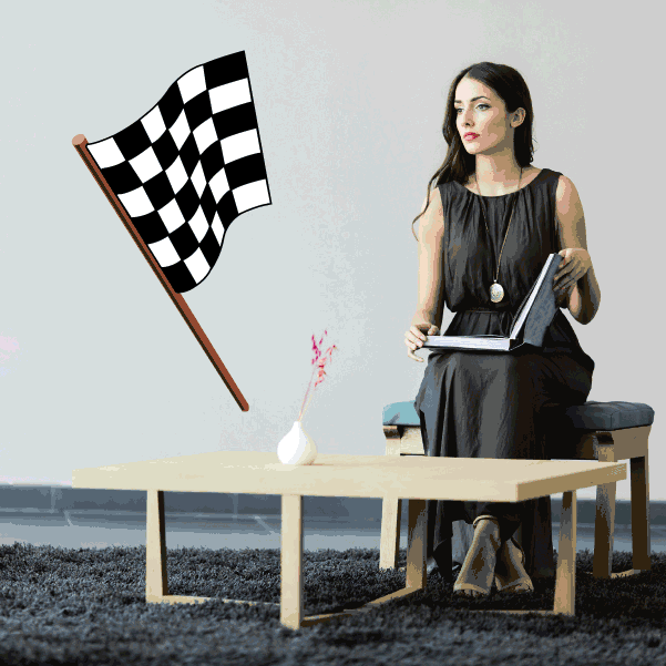 Black-and-white checkered racing flag sticker on a wooden stick