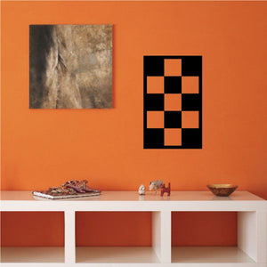Checkered wall decal with black and orange square pattern