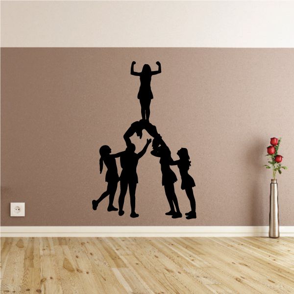 Cheer tower wall decal with black cheerleader silhouettes in a stacking formation