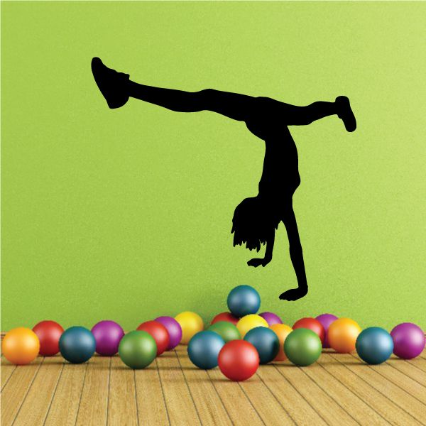 Cheer wall decal: cheerleader silhouette above colorful balls