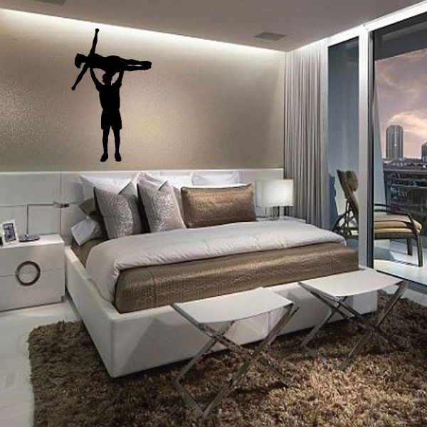 Cheer wall decal featuring a black cheerleader silhouette performing a stunt