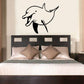 Playful dolphin greeting wall decal, black silhouette with wave lines