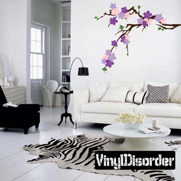 Cherry blossom branch wall decal with pink and purple flowers and green leaves