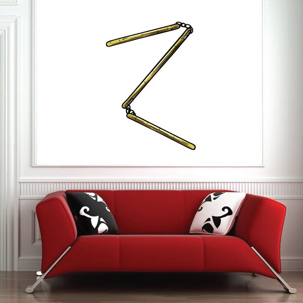 Red sofa cushions with black and white swirl decorative decals