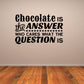 Chocolate-themed wall decal with bold quote text in black and white