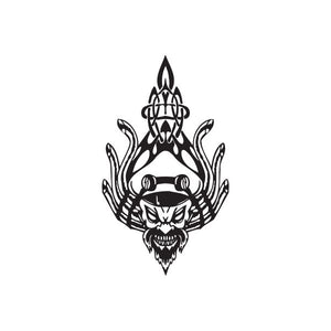 Black vinyl wall decal of a skull with flames and tribal design