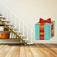 Christmas present sticker with red bow and dotted blue gift box