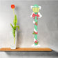 Christmas lamp post sticker with mint post, red ribbon bows, and white snow accents