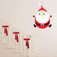 Santa Claus cartoon wall sticker with red hat, white beard, black belt, and wide-eyed face