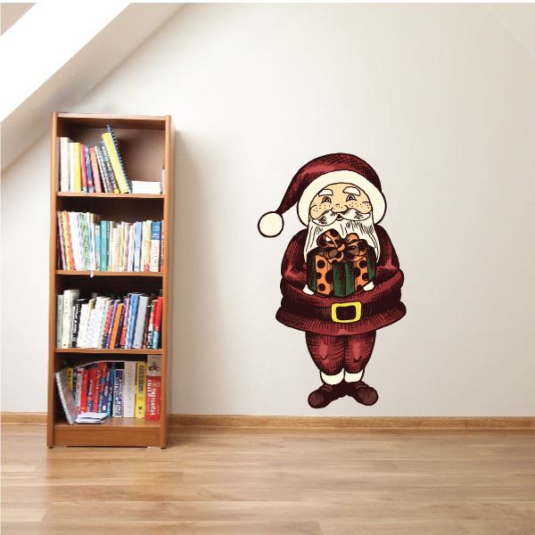 Image of Christmas Santa Holding Present Pose Sticker