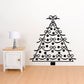 Christmas tree wall decal with ribbon bows and dotted ornaments, black