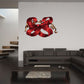 Christmas ribbon sticker with very curly red bow and curled loops