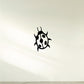 Ladybug decal with black outline, white belly, and black spots