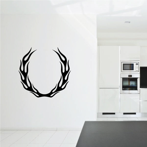 Black flame circle wall decal with pointed flame segments