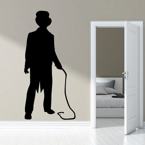 Black circus ringmaster silhouette wall decal, standing with whip in hand