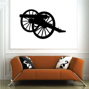 Black civil war cannon wall decal with large spoked wheels and barrel
