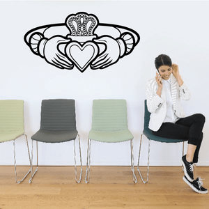 Vinyl car decal with crown, heart, and hands in black outline