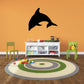 Dolphin diving wall decal with a bold black silhouette