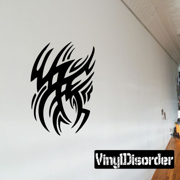 Black tribal vinyl wall decal with flame-like head silhouette