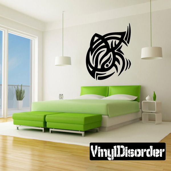 Black tribal animal head vinyl wall decal with bold curved lines