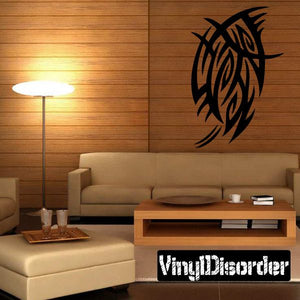 Black tribal vinyl wall decal with stylized circular motif and wings
