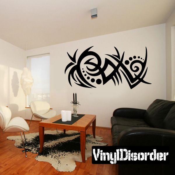 Black tribal fish wall decal with decorative swirls and dots