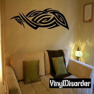 Black tribal wall decal with swirling knot-like design