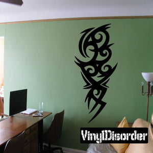 Black tribal vinyl wall decal with ornate swirl and arrow shapes